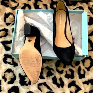 Only worn once, they are swayed shoes